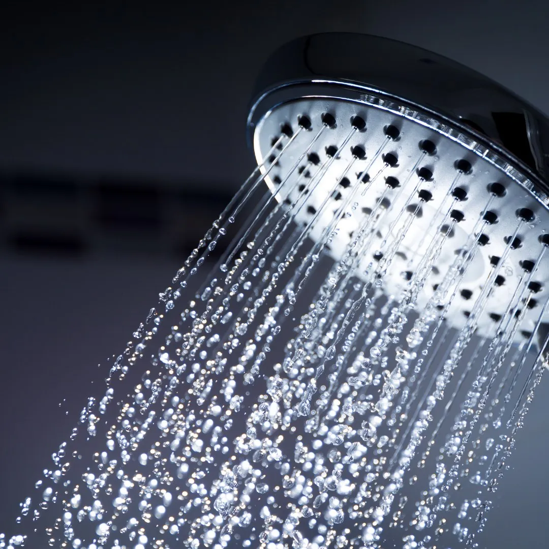 Water flowing from a rain shower head